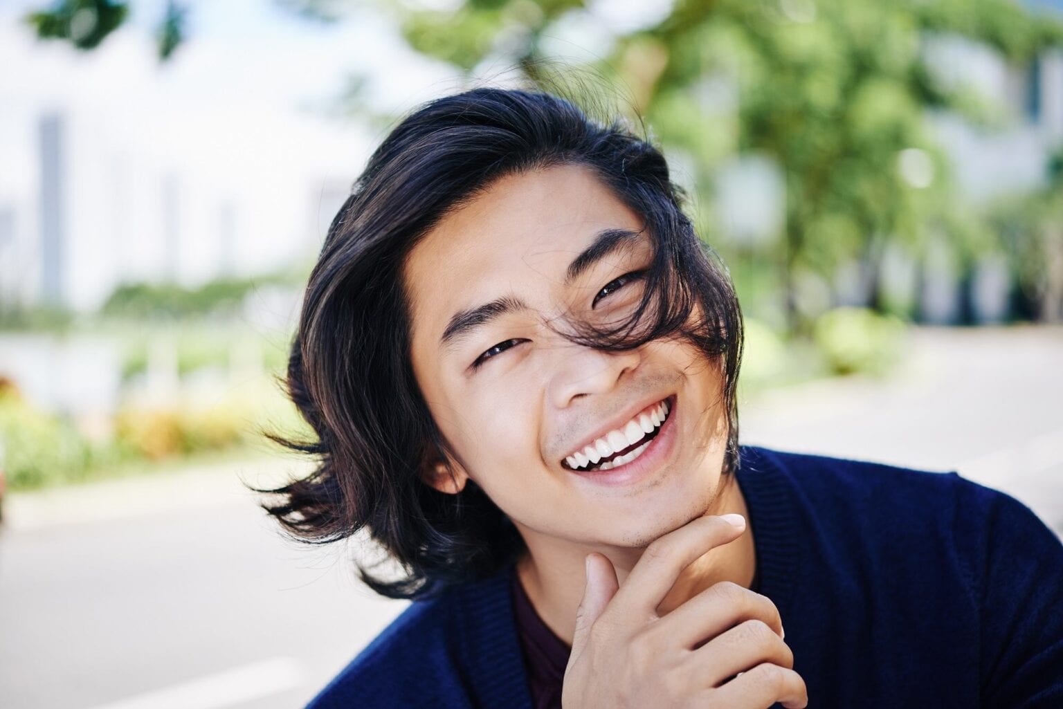 K-pop hairstyle for men with soft volume and textured fringe