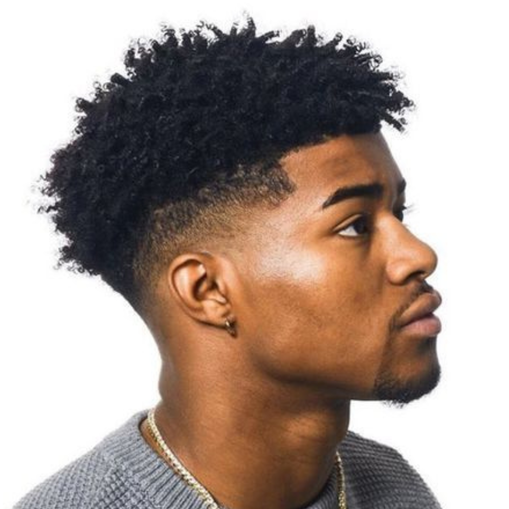 Curly low fade hairstyle for men