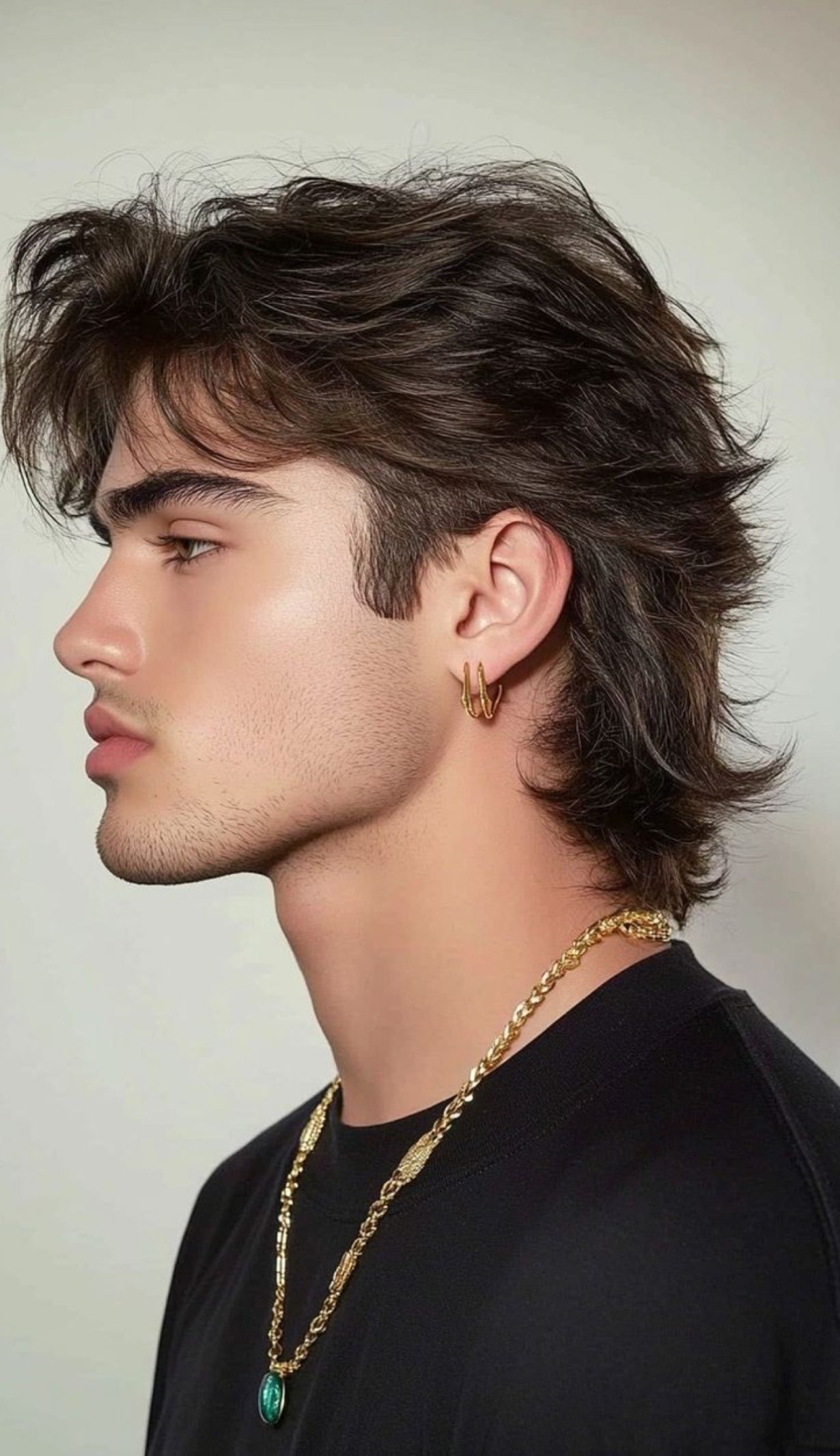 Long feathered modern mullet hairstyle for men